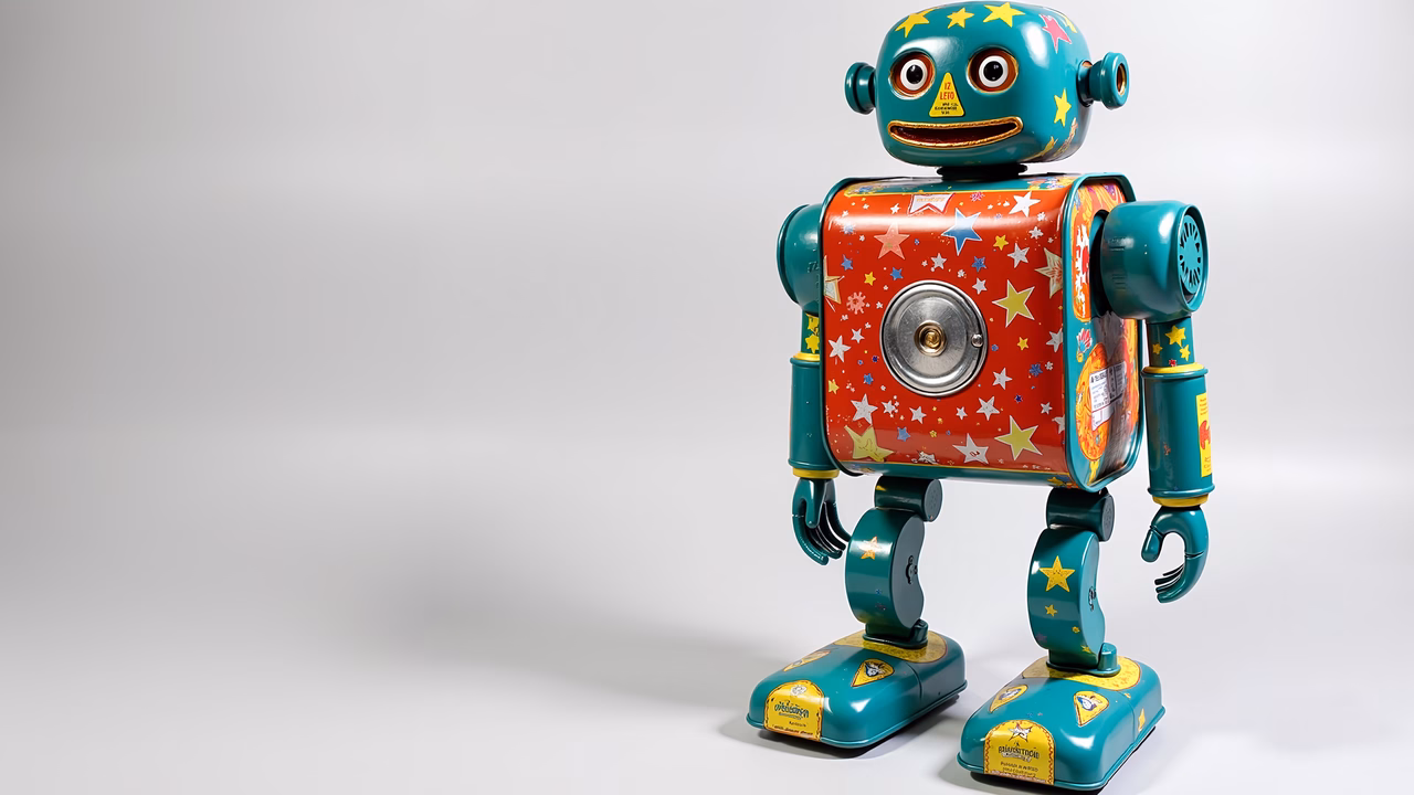 Vintage robot toy with teal body and colorful details, perfect for collectors.
