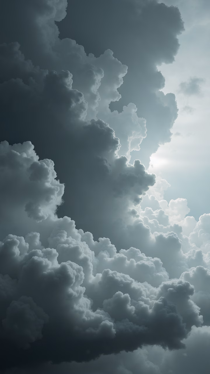 Dramatic sky with billowing clouds and filtering sunlight.