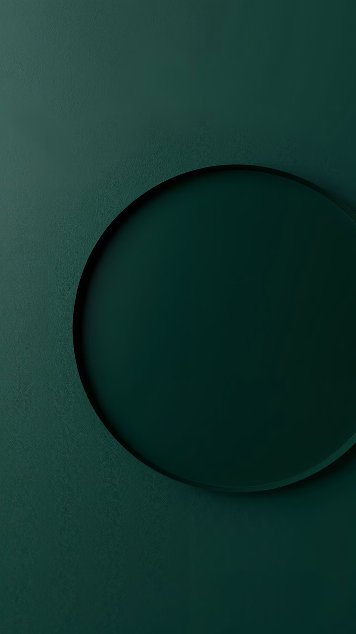 Minimalist green circle casting a shadow on textured background
