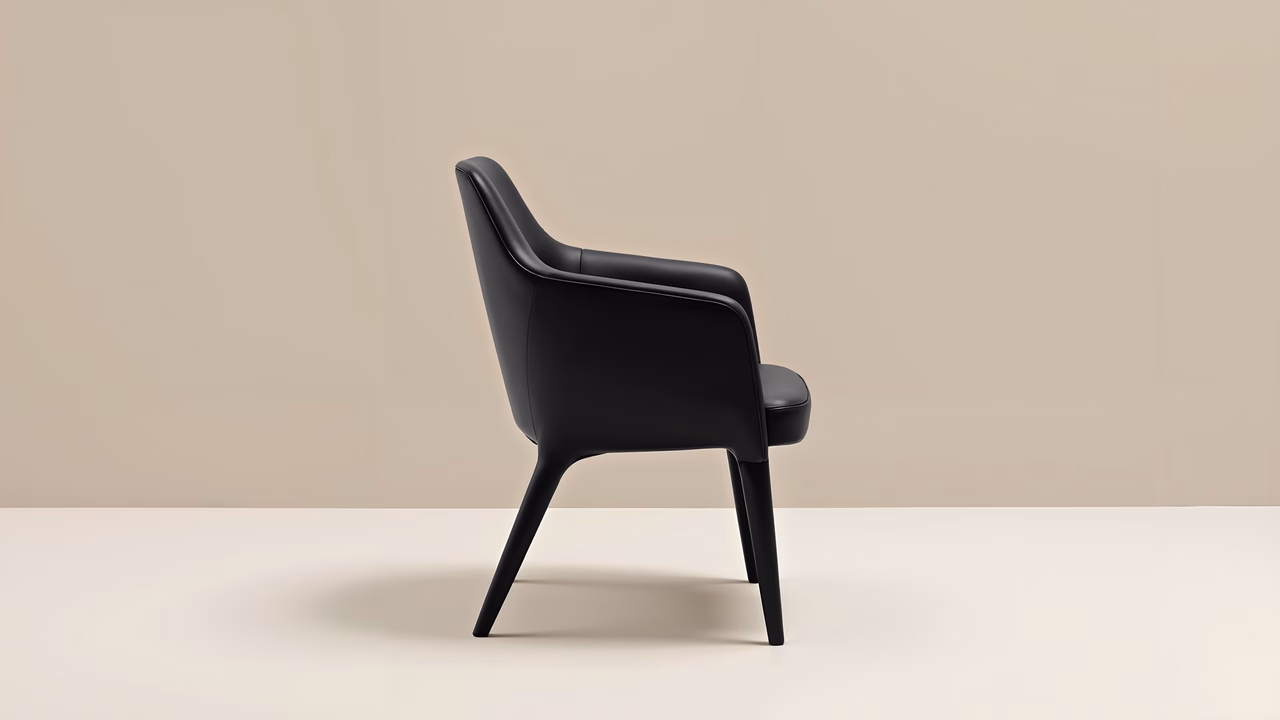 Minimalist black chair with elegant curves and modern design.