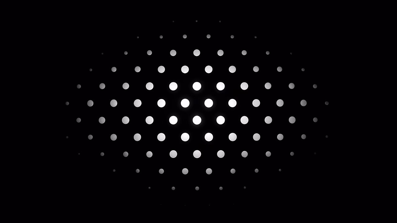 Circular dot array on a black background, minimalist abstract art.
