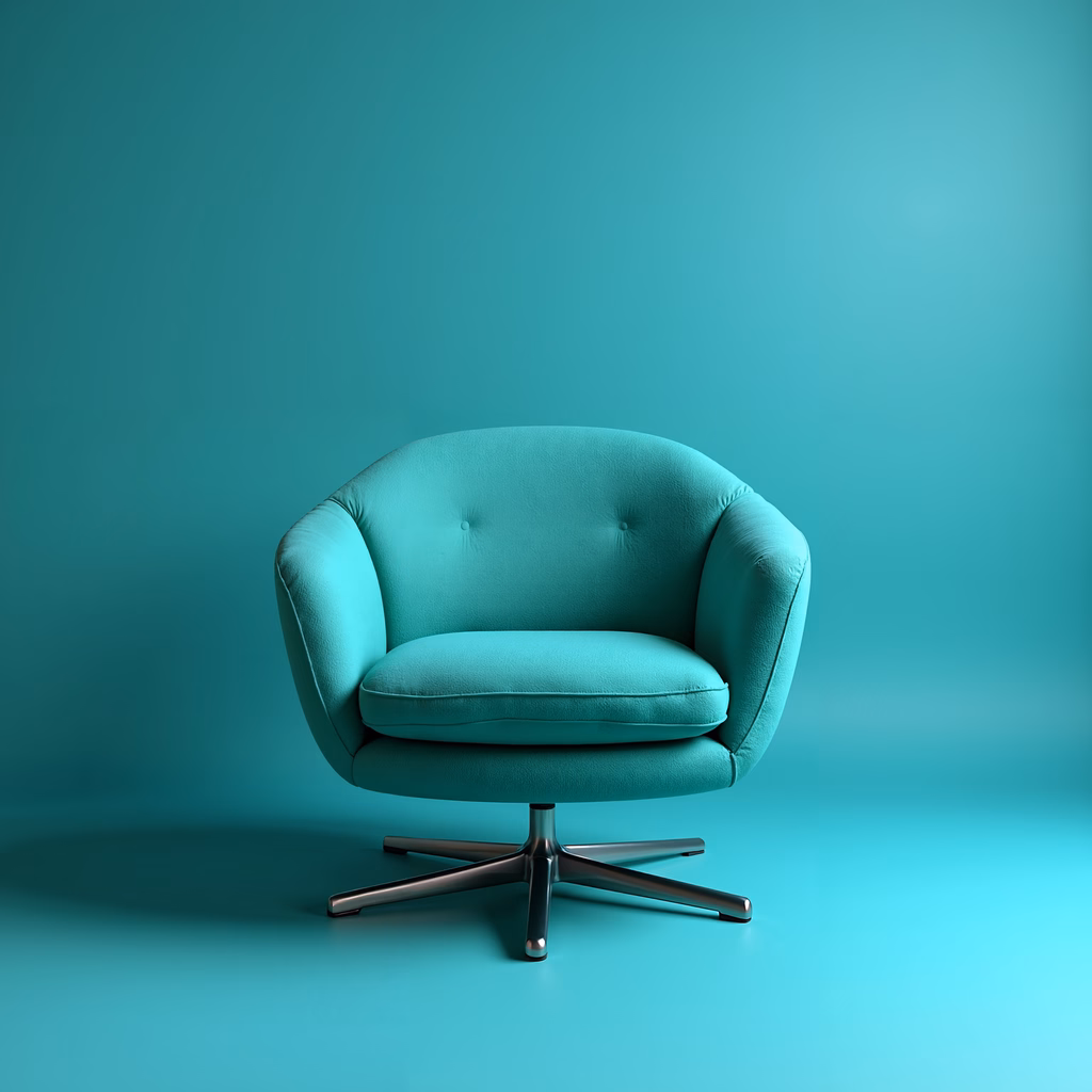 Minimalist teal armchair against a matching background, perfect for interior design enthusiasts.