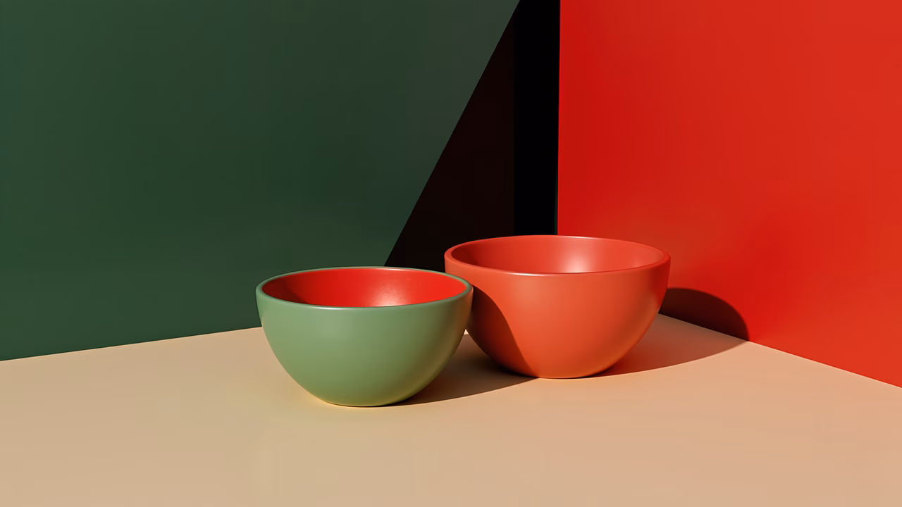 Minimalist illustration of colorful bowls against contrasting backgrounds.
