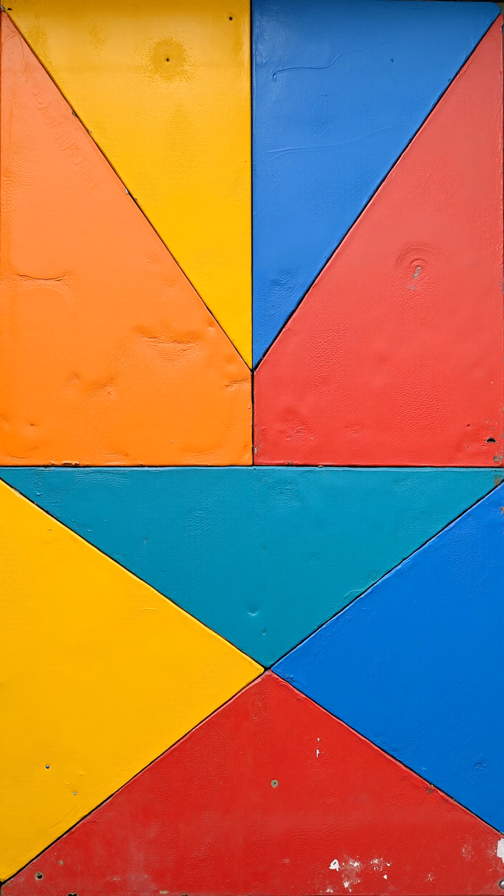 Brightly colored geometric shapes arranged in a symmetrical pattern.