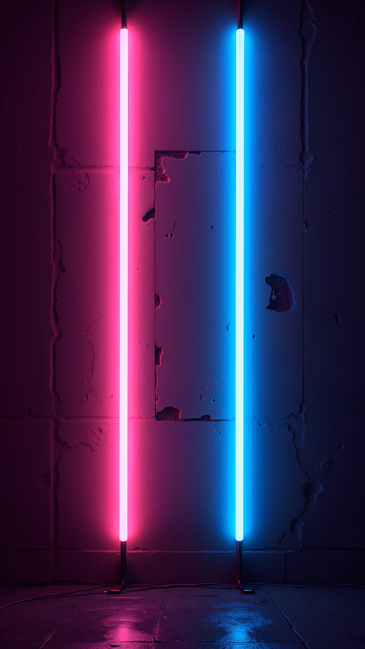 Vibrant neon lights against a grungy, textured wall create a bold and industrial atmosphere.