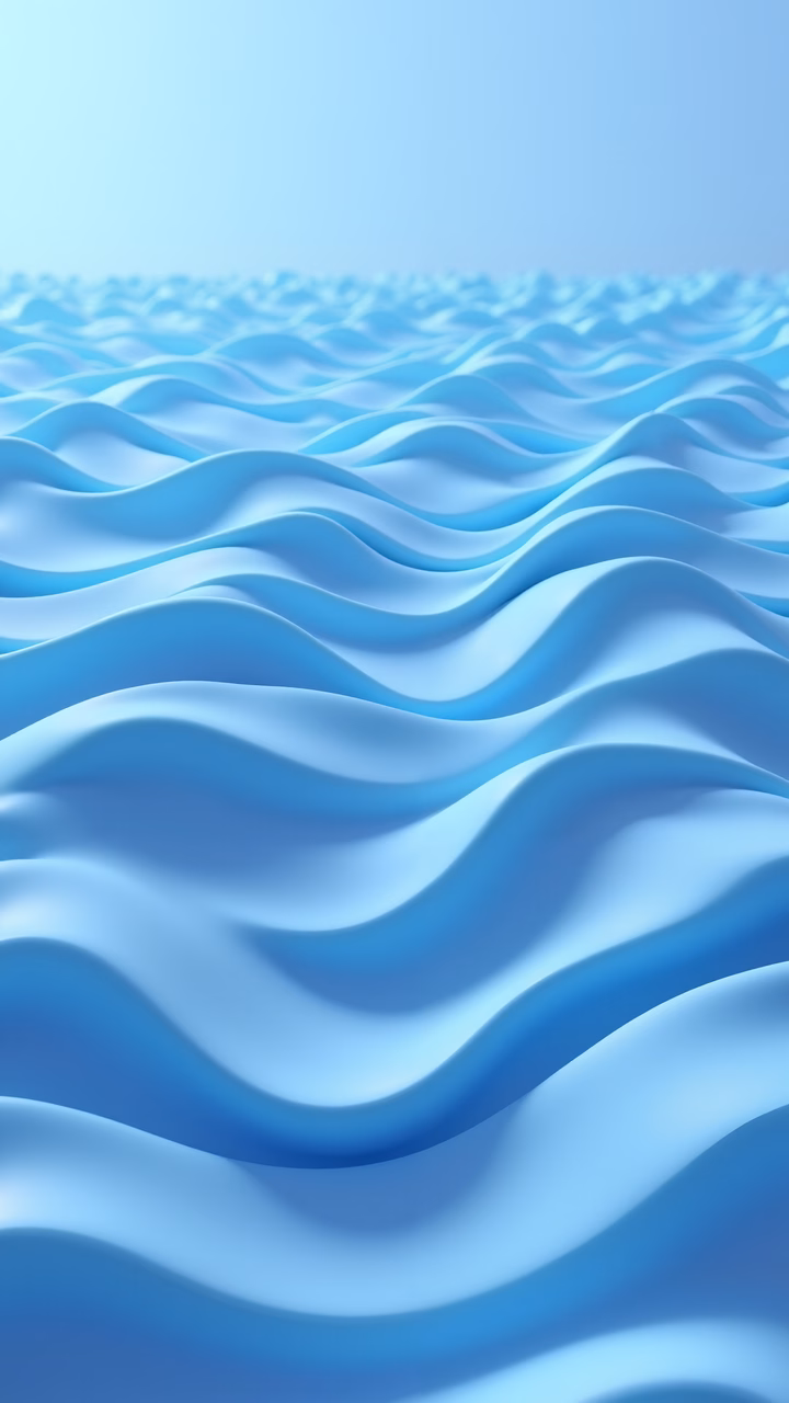 Smooth ocean waves in soothing shades of blue, creating a tranquil coastal atmosphere.