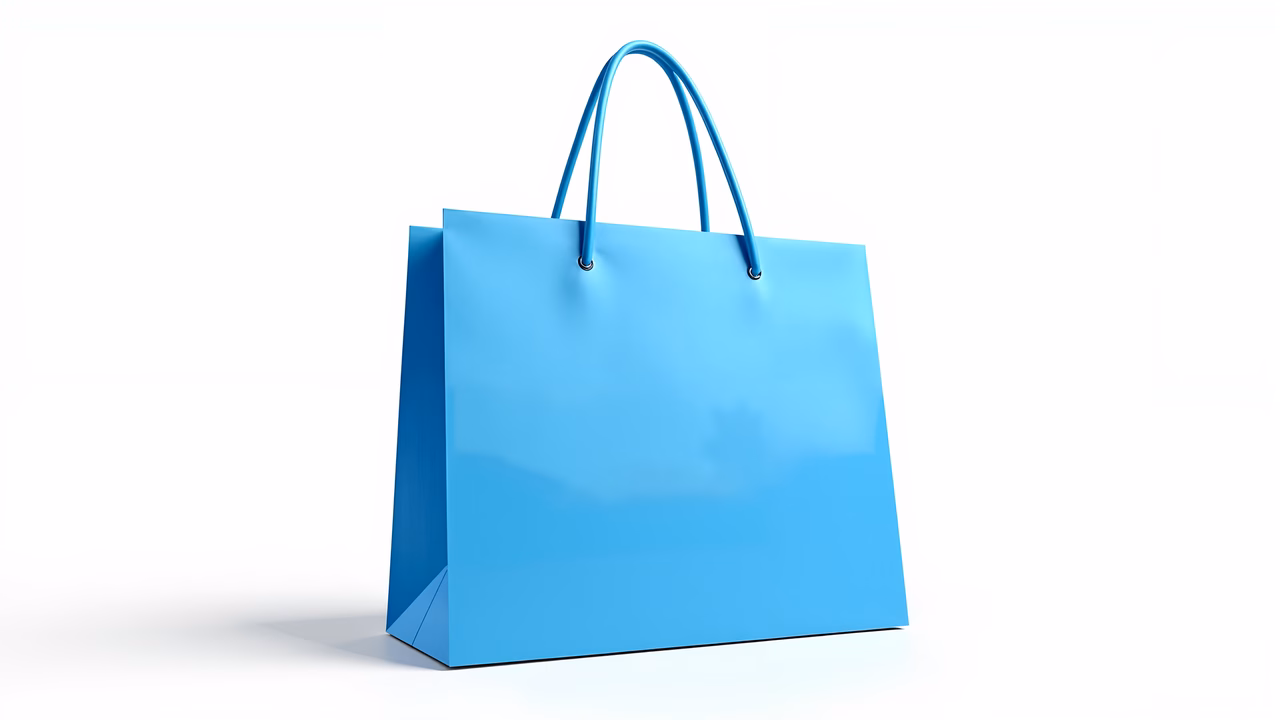 Glossy blue shopping bag with bright handles on a white background.