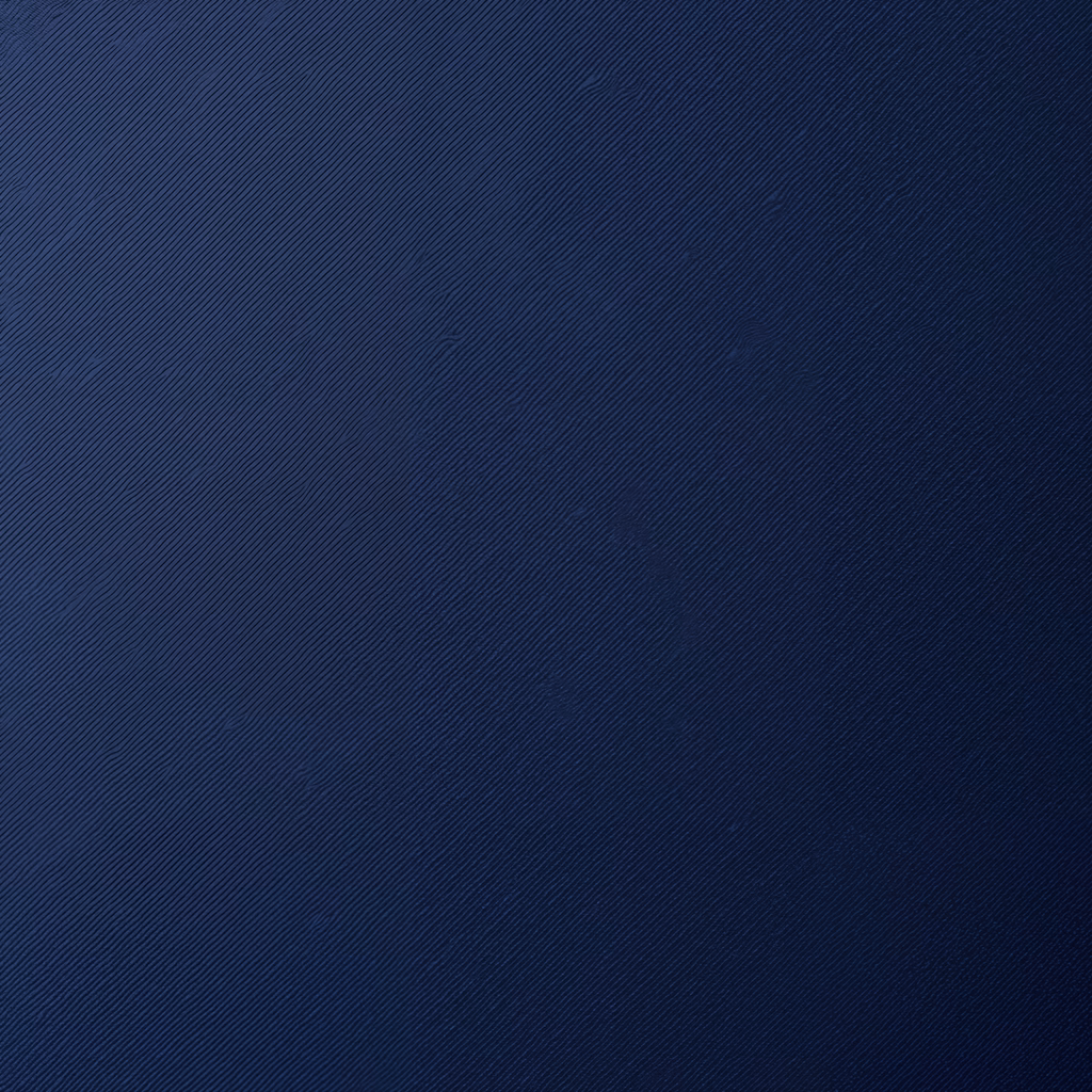 Close-up of deep navy textured fabric with diagonal ribbing.