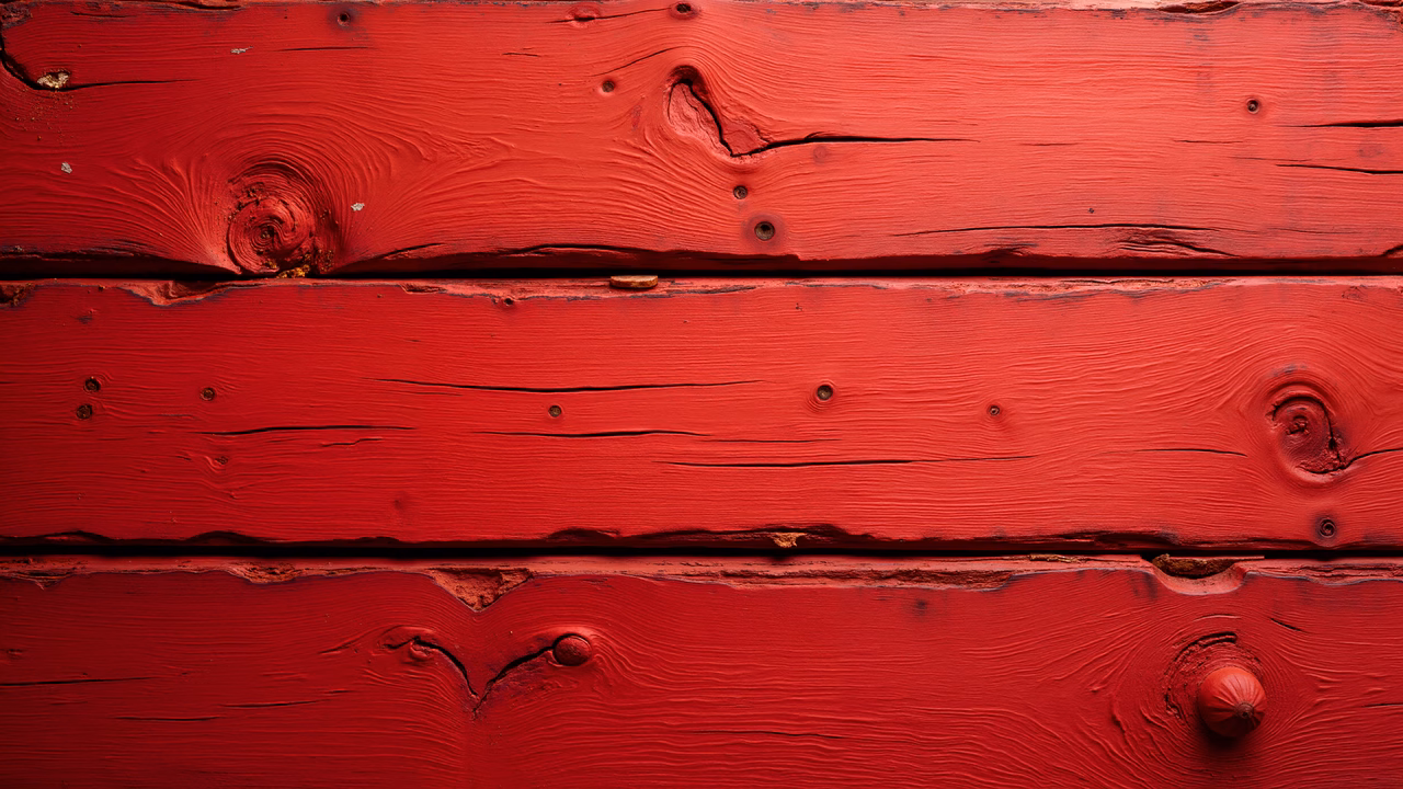 Close-up of red wooden planks showcasing texture and color.