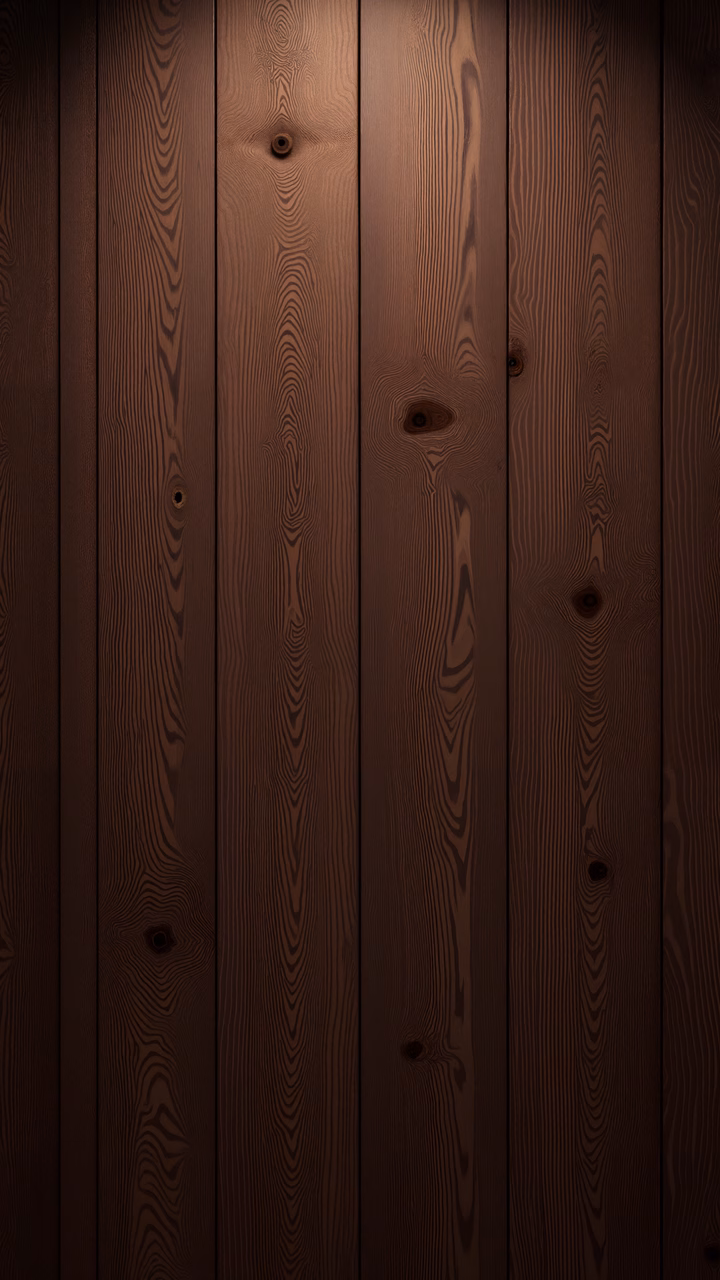 Close-up of wooden planks with natural grain patterns and warm tones.