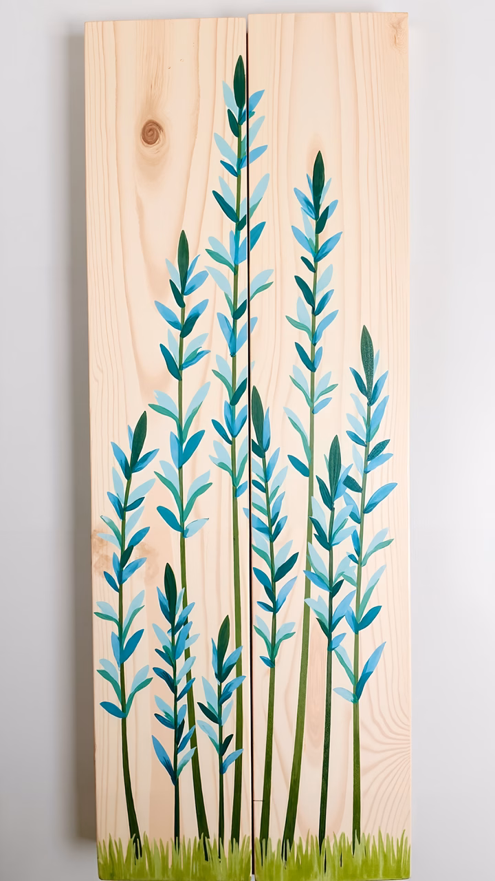 Simple blue grass illustration on wood, serene and natural vibe.
