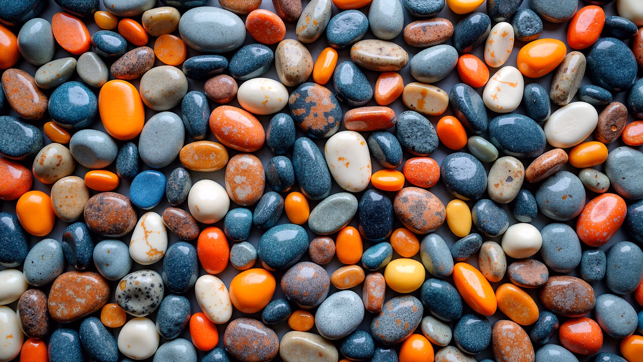A colorful illustration of pebbles with diverse textures and hues.