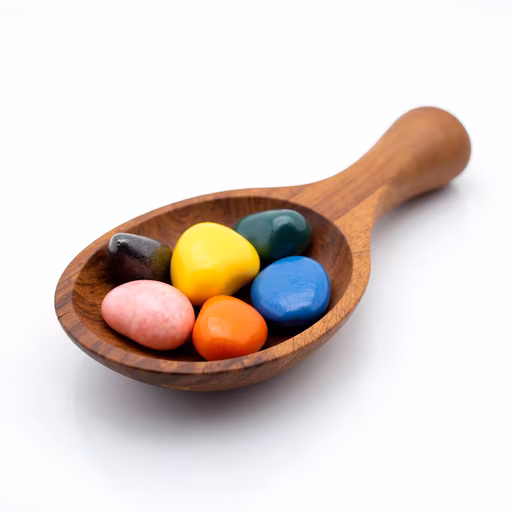 Colorful Candies in Wooden Spoon