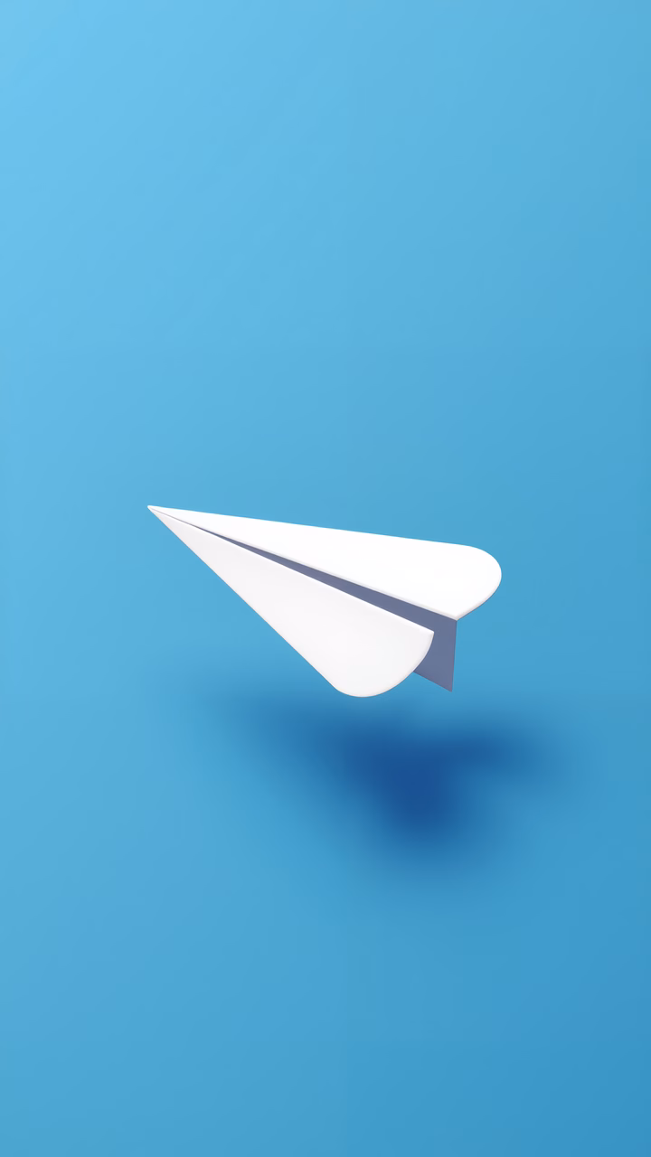 Minimalist paper airplane on a blue background