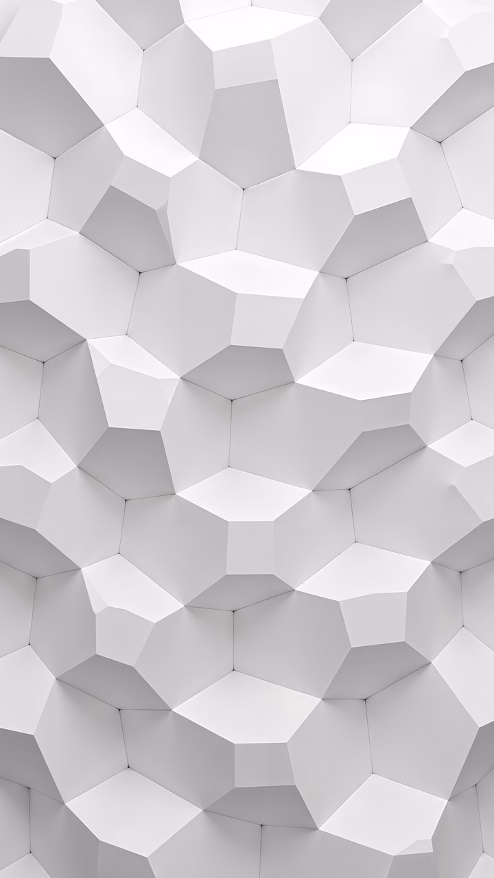 Abstract geometric pattern in shades of white and gray, creating a serene and contemplative atmosphere.