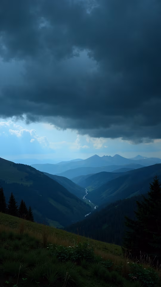 Mountain Valley Under Stormy Sky