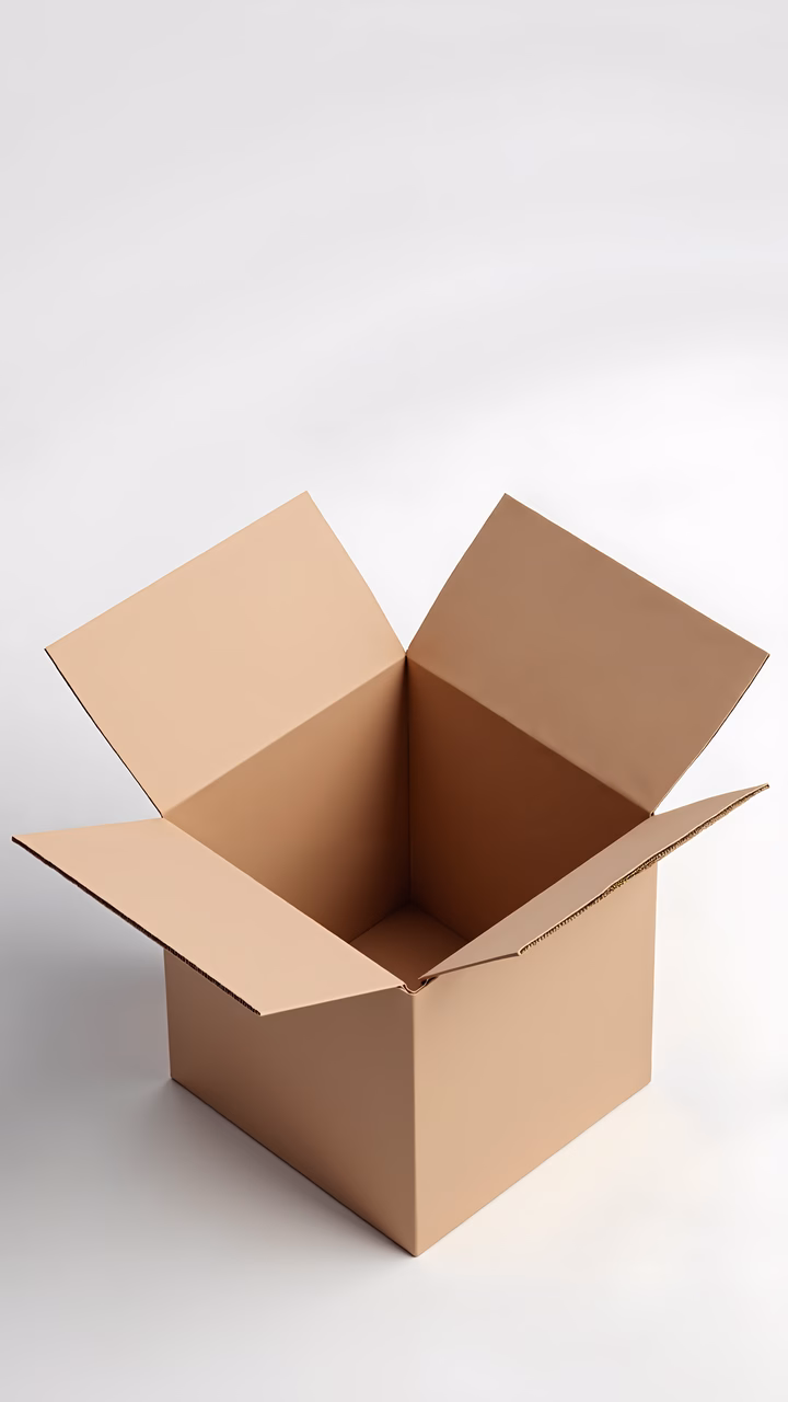 Minimalist still life of an open cardboard box on a white background.