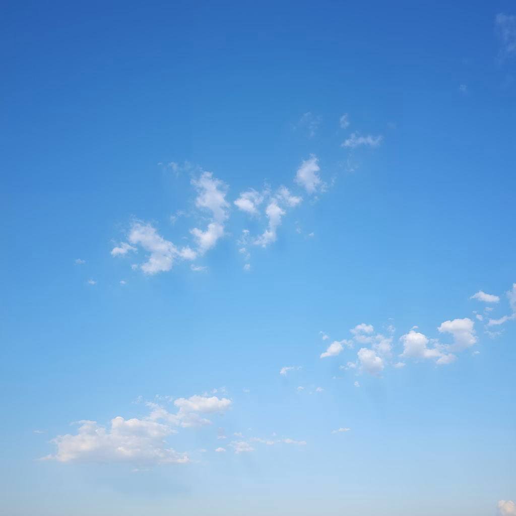 A serene blue sky with scattered clouds, perfect for relaxation and meditation.