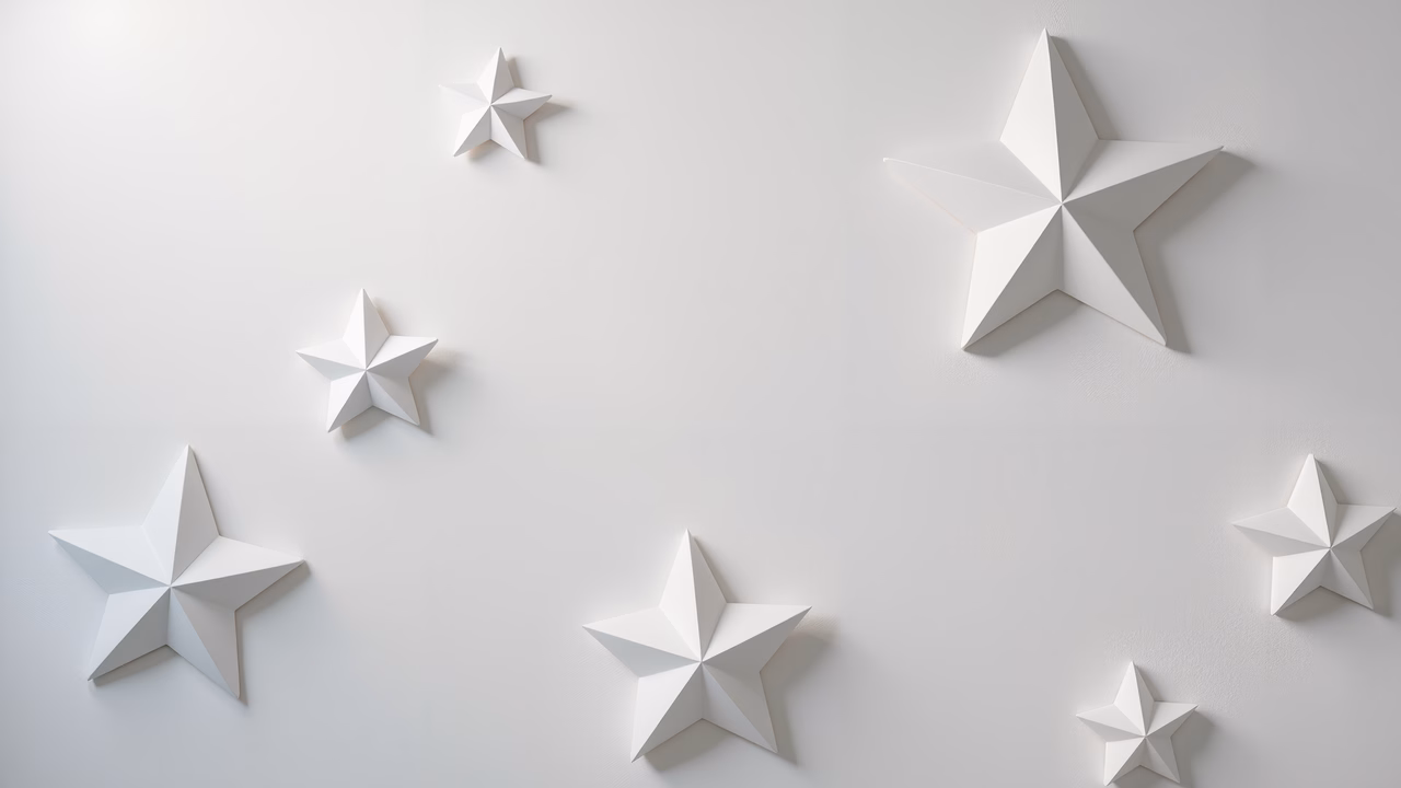 Minimalist white stars on a white background, creating a serene and elegant look.