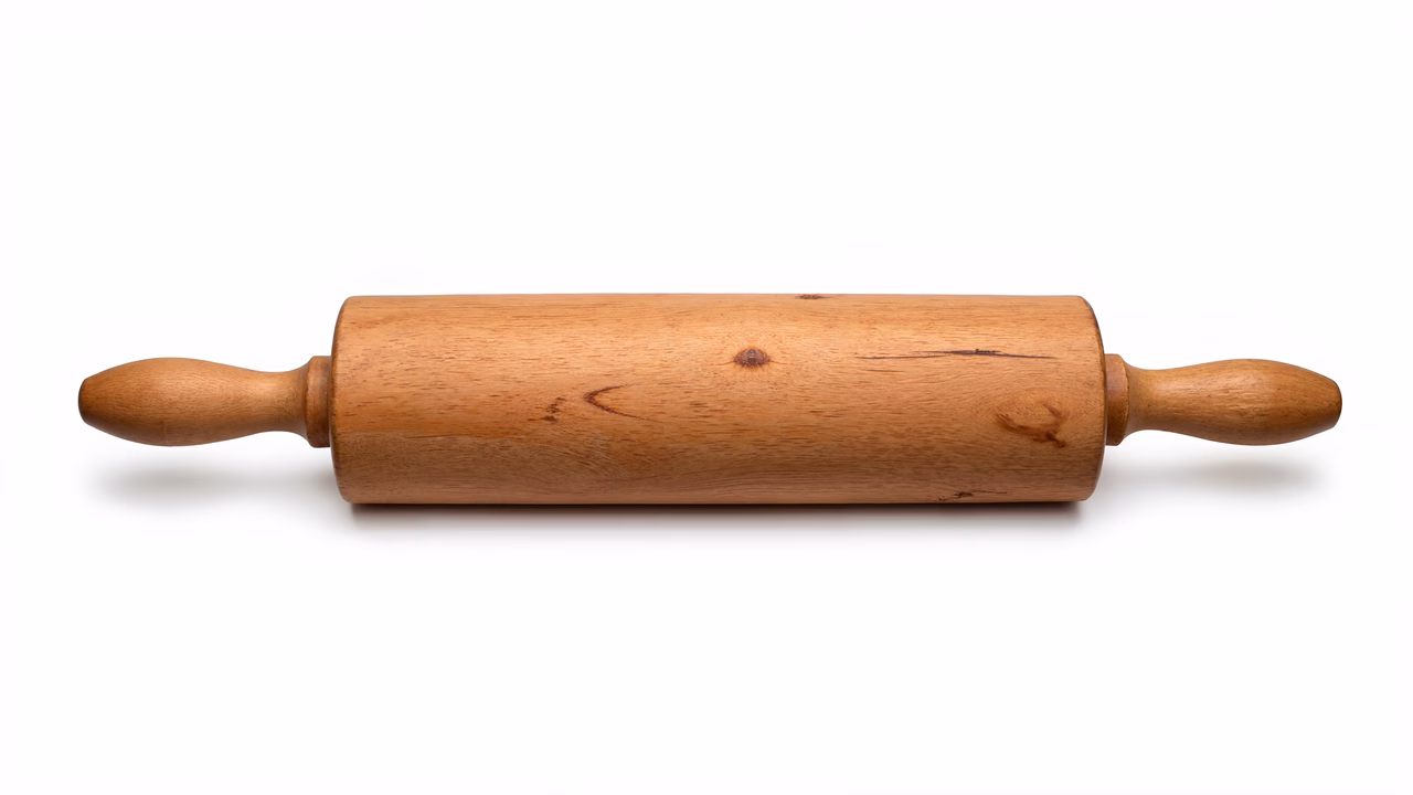 Close-up of a wooden rolling pin with natural grain and smooth surface, set against a white background.