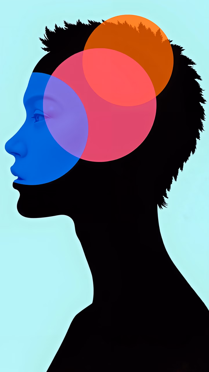 Silhouette of a head with colorful overlapping circles, symbolizing identity and diversity.