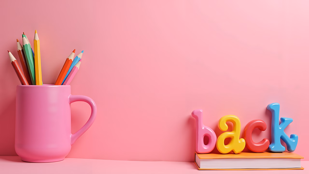 Vibrant back-to-school illustration featuring colorful pencils and bold letters spelling 'back.'