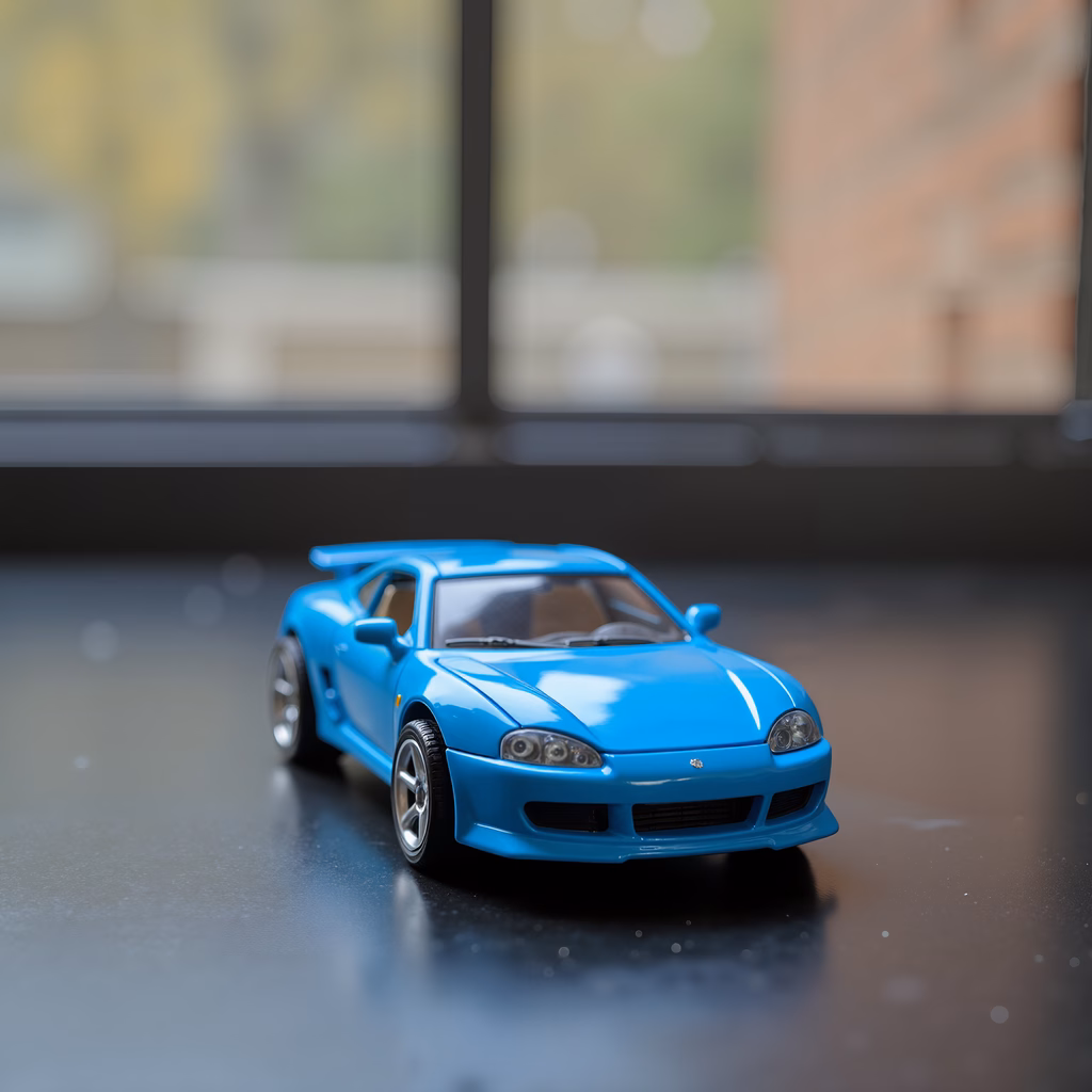Vibrant blue sports car model against urban bokeh background.