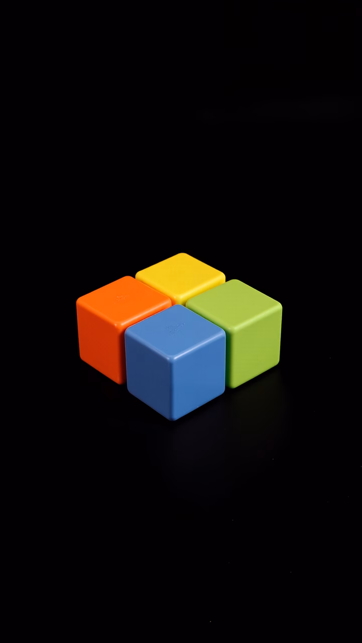 Brightly colored cubes on a black background, minimalistic design.